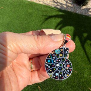 Reversible nautilus pendant with beautiful, shimmery celestial design